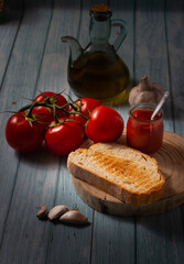 Slice of homemade bread with oil, tomato and garlic. Typical breakfast from Catalonia, Spain.