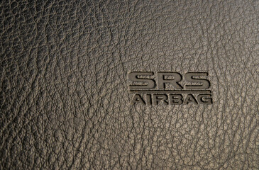SRS Airbag Logo on Dashboard of Car