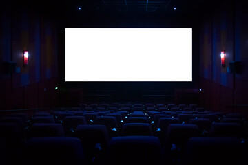 Empty cinema auditorium with empty white screen. Empty rows of theater or movie seats.
