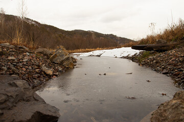 View of frozen lake below the Fitzroy Mountains