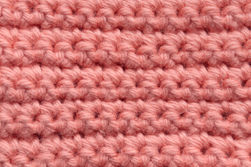 Crochet handmade square pattern, knitting crocheting top view on a wooden background