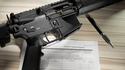 Assault rifle on safe with background check form - obrazy, fototapety, plakaty