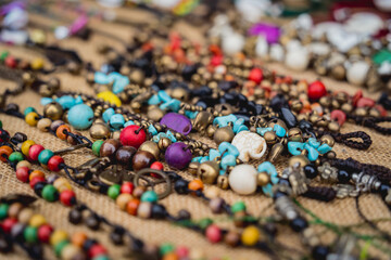 Many colorful bracelets from handcraft souvenirs shop