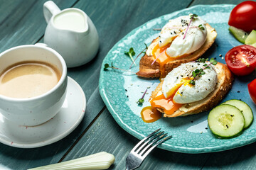 Sandwich with Poached Egg with cup of coffee, Delicious breakfast or snack, Clean eating, dieting, vegan food concept. top view