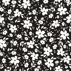 Cute floral pattern. Seamless vector texture. An elegant template for fashionable prints. Print with white flowers and leaves,dots.  black background.
