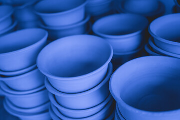 Ceramic plates on the table at the workshop