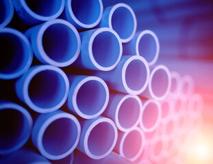 Background of the blue plastic pipes in stacked - obrazy, fototapety, plakaty