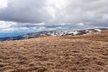 Scenic view of snow covered alpine meadow on hiking trail between Gertrusk and Ladinger Spitz,...