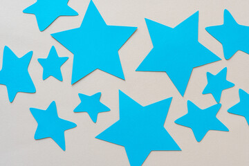 blue paper stars on beige
