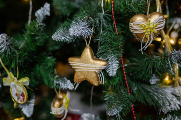 The Christmas tree is decorated with decorations and lights.The concept of the Christmas atmosphere, New Year holidays