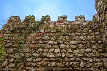 Fototapeta na wymiar Thousand-year-old Moorish fortress on a hill near Sintra, Portugal 