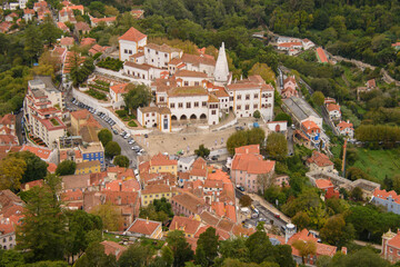 Fototapeta na wymiar View of part of the town of Sintra and the National Palace in Portugal from the Moorish fortress which overlooks the town.