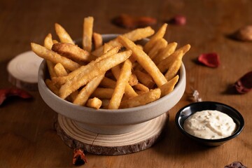 Fototapeta na wymiar Closeup shot of a fries on a bowl
