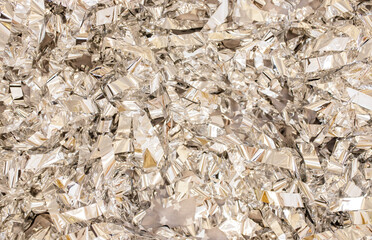 Beautiful shiny background with patches and sequins on a light background