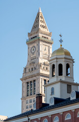 Old church steeple cross and bell tower in the city	
