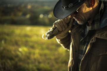 Pensive Cowboy Rancher Profile Outdoor Portrait