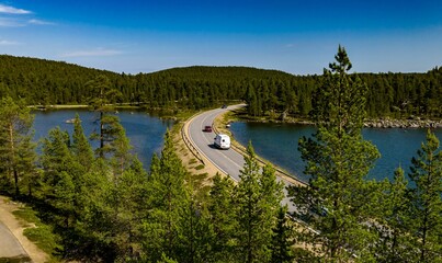 Obraz premium Motorhome and cars driving in Inari, Lapland