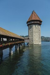 Vertical shot of the water tower of Chapel Bridge on Reuss river in Lucerne, Switzerland