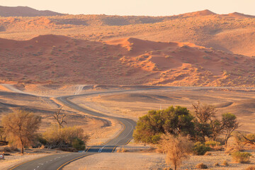 Asphalt road to Soussusvlei, Namib-Naukluft National Park of Namibia.