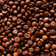 Dark roast coffee beans background, top view