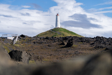 Fototapeta na wymiar Reykjanes lighthouse on top of hill at Reykjanes peninsula, Iceland, Europe