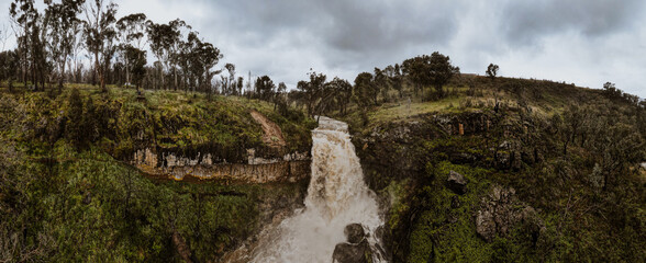 Aerial view of Paddy's River Falls after heavy rain. Heavy flowing waterfall in New South Wales,...