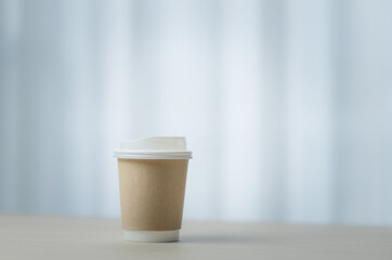 Paper cup of takeaway coffee