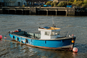 Fototapeta na wymiar Sunderland UK: 1st oct 2022: Fishing boats moored on the River Wear in Sunderland city