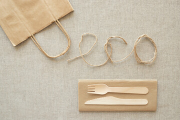Topic of eco friendly, disposable, recyclable dishes, takeaway, zero waste. Paper bag, wooden...
