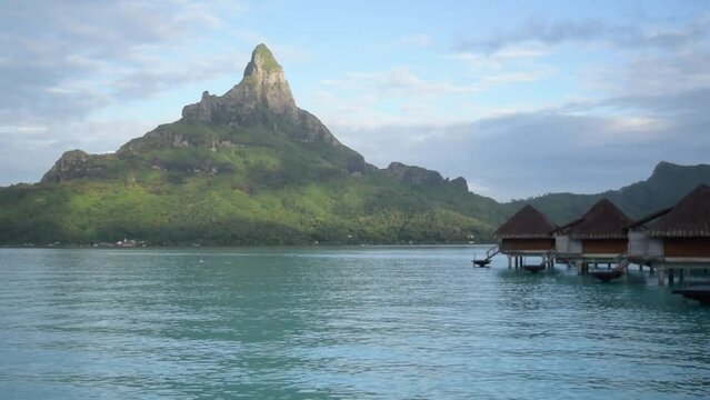 Beautiful view of the sea and the mountain in the distance in Bora Bora, French Polynesia.