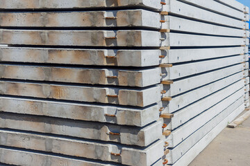 Concrete slabs stacked. Material for construction. Background for supplier. Reinforced concrete floors.