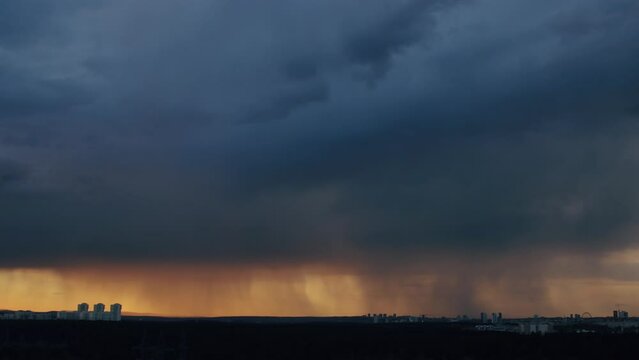 A shot of thunderclouds over a city