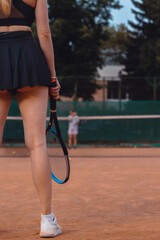 Close Up of Woman Playing Tennis And Wiaiting Ball Serve With a Racket. Playing Tennis Outdoors
