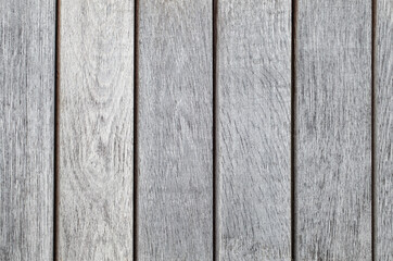 Wooden boards old gray dried, vertically arranged, background close-up