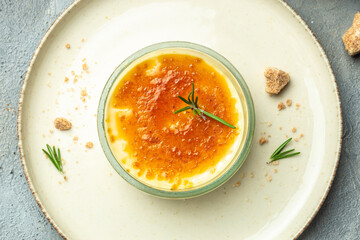 cream brulee, creme brule, traditional french vanilla cream dessert with caramelised sugar, Food recipe background. Close up