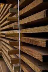 Vertical closeup of a wall built with pieces of dowel