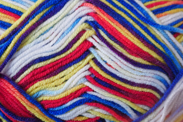 detail shot of colorful yarn on table 
