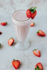 Vertical shot of a strawberry milkshake