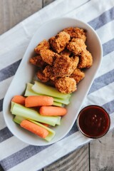 Vertical shot of Homemade Chicken Nuggets and Veggies