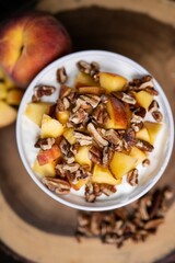 Vertical shot of Breakfast Cereals with Peaches and Pecans