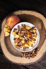 Vertical shot of Breakfast Cereals with Peaches and Pecans