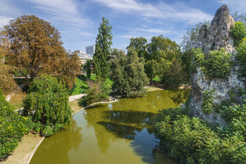 Fototapeta na wymiar Buttes Chaumont Park, Paris, France. View from the bridge.