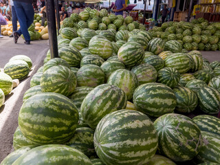 Fototapeta na wymiar From September, the bazaars are full of different types of melons in From September, the bazaars are full of different types of melons in Uzbekistan.