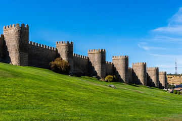 Fototapeta na wymiar The Roman Walls of Avila a sunny summer day. Spain
