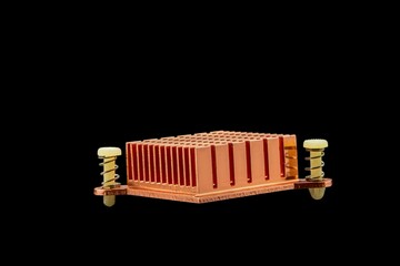 Copper heatsink to release heat from the chipset isolated in black background