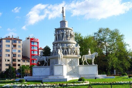 White Victorial monument with multiple sculpturec  in Eskisehir city center in a sunny summer day