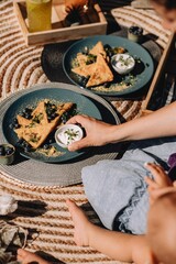 French toast breakfast with yogurt and blueberries with fresh fruit lemonades and cappucino