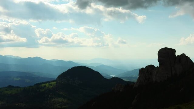 Beautiful view over the landscapes of the Ciucas mountain range under a cloudy sky