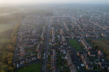 Obraz premium Aerial Houses Residential British England Drone Above View Summer Blue Sky Estate Agent Morning Sunrise House Prices 2022.