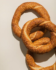 Turkish simit (bagel) closeup on beige background